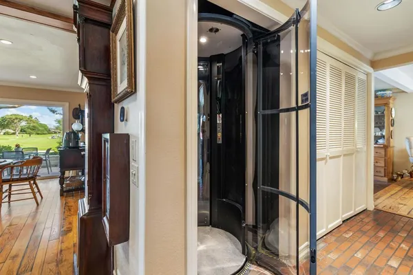 a view of a dining room with furniture window and outside view