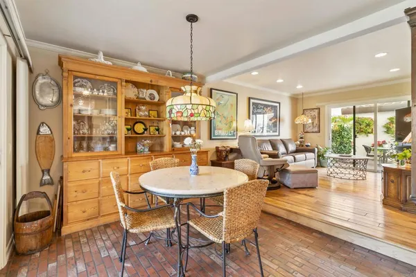 a view of a dining room with furniture window and outside view