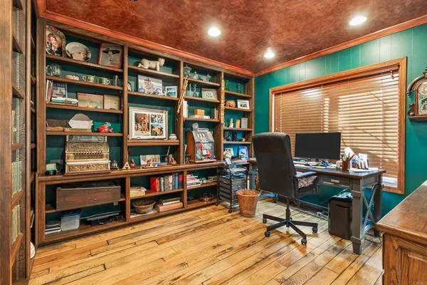 a room with furniture and a book shelf