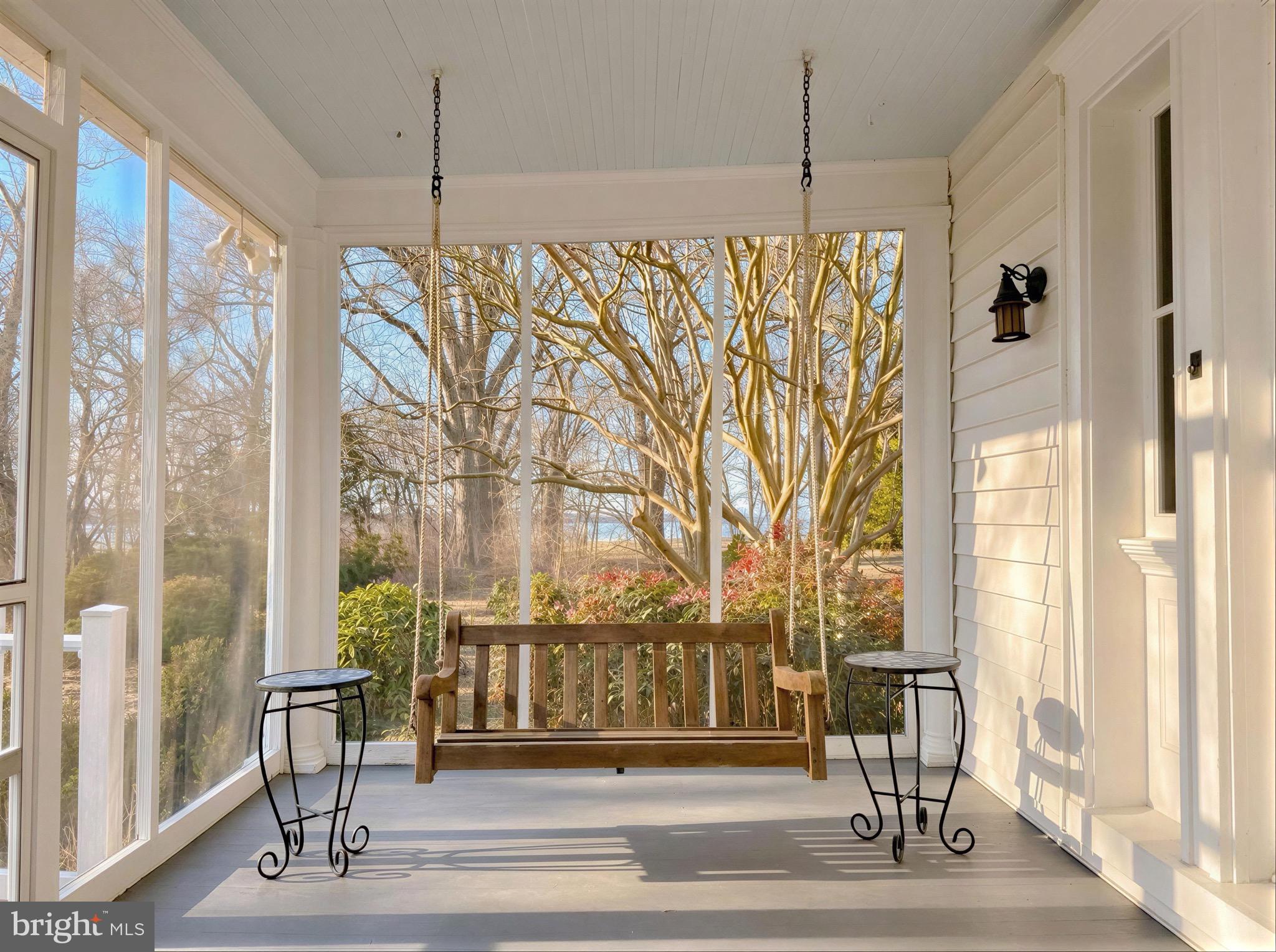 2790 Spout Lane Lusby, MD 20657 - Photo 20 of 95 Screened porch designed for relaxing and swinging.