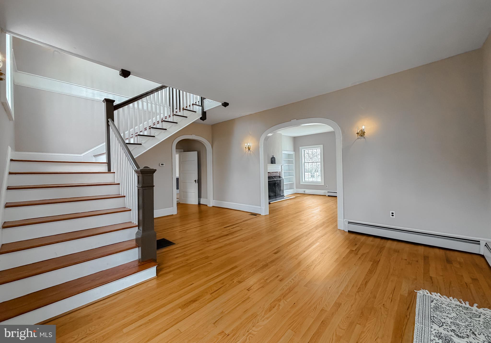 2790 Spout Lane Lusby, MD 20657 - Photo 24 of 95 a view of entryway and hall with wooden floor