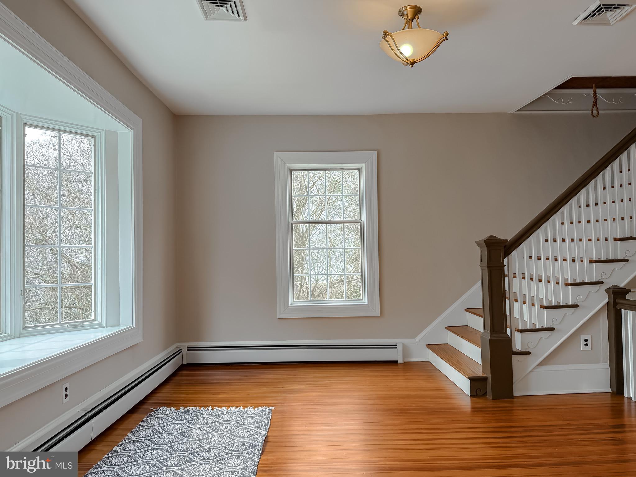 2790 Spout Lane Lusby, MD 20657 - Photo 52 of 95 a view of a room with wooden floor and window
