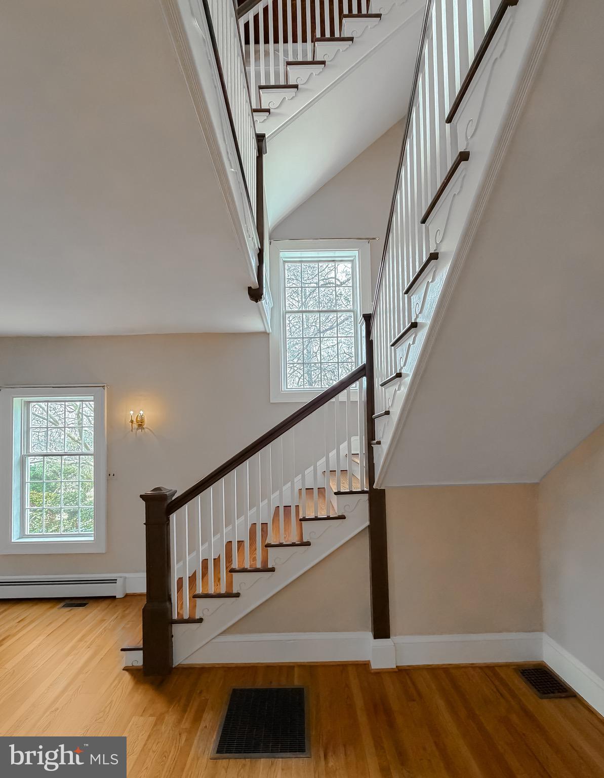 2790 Spout Lane Lusby, MD 20657 - Photo 58 of 95 a view of entryway with wooden floor and stairs