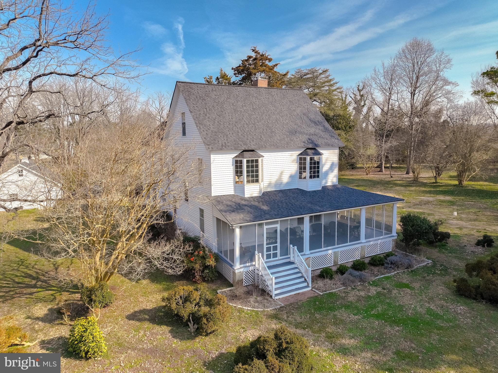 2790 Spout Lane Lusby, MD 20657 - Photo 7 of 95 a front view of a house with a yard