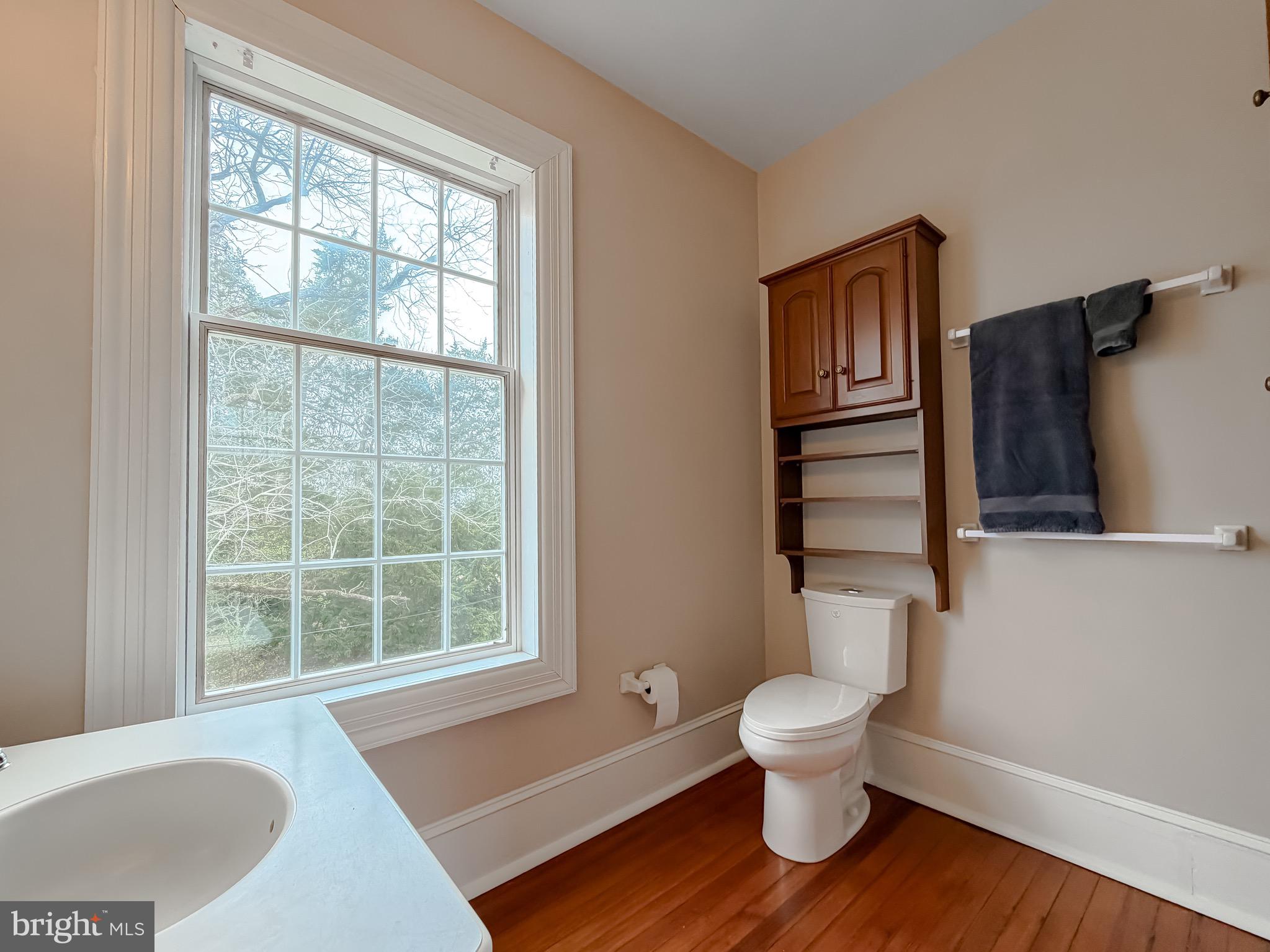 2790 Spout Lane Lusby, MD 20657 - Photo 72 of 95 a bathroom with a toilet and a window