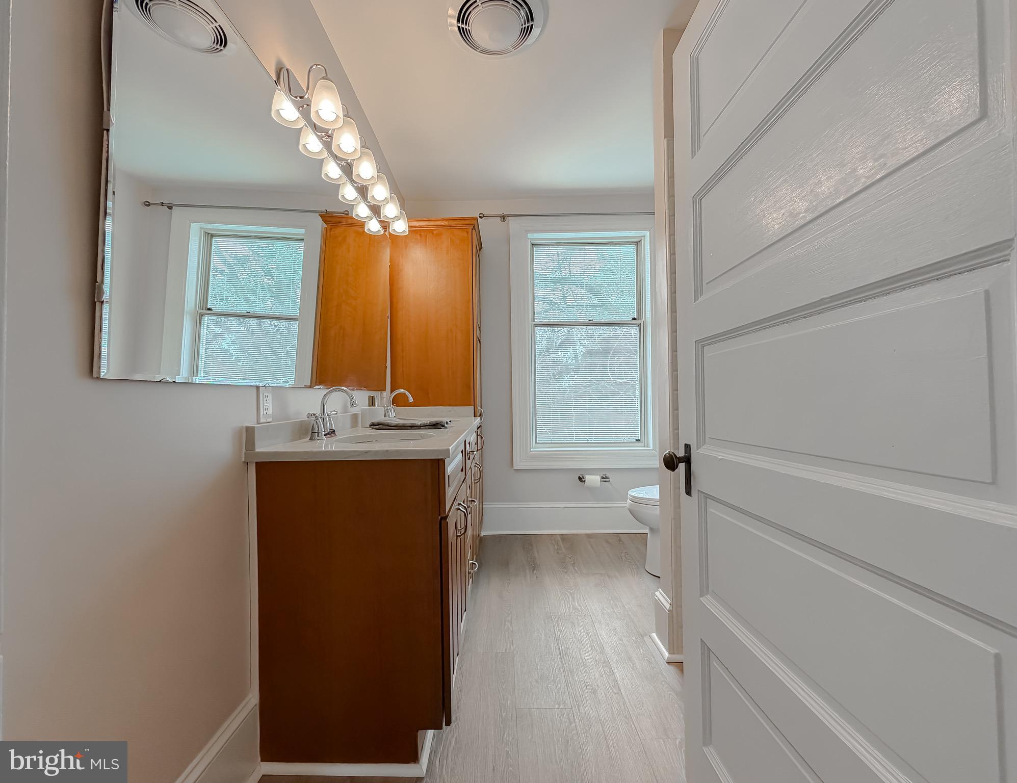 2790 Spout Lane Lusby, MD 20657 - Photo 73 of 95 a bathroom with a sink and a mirror