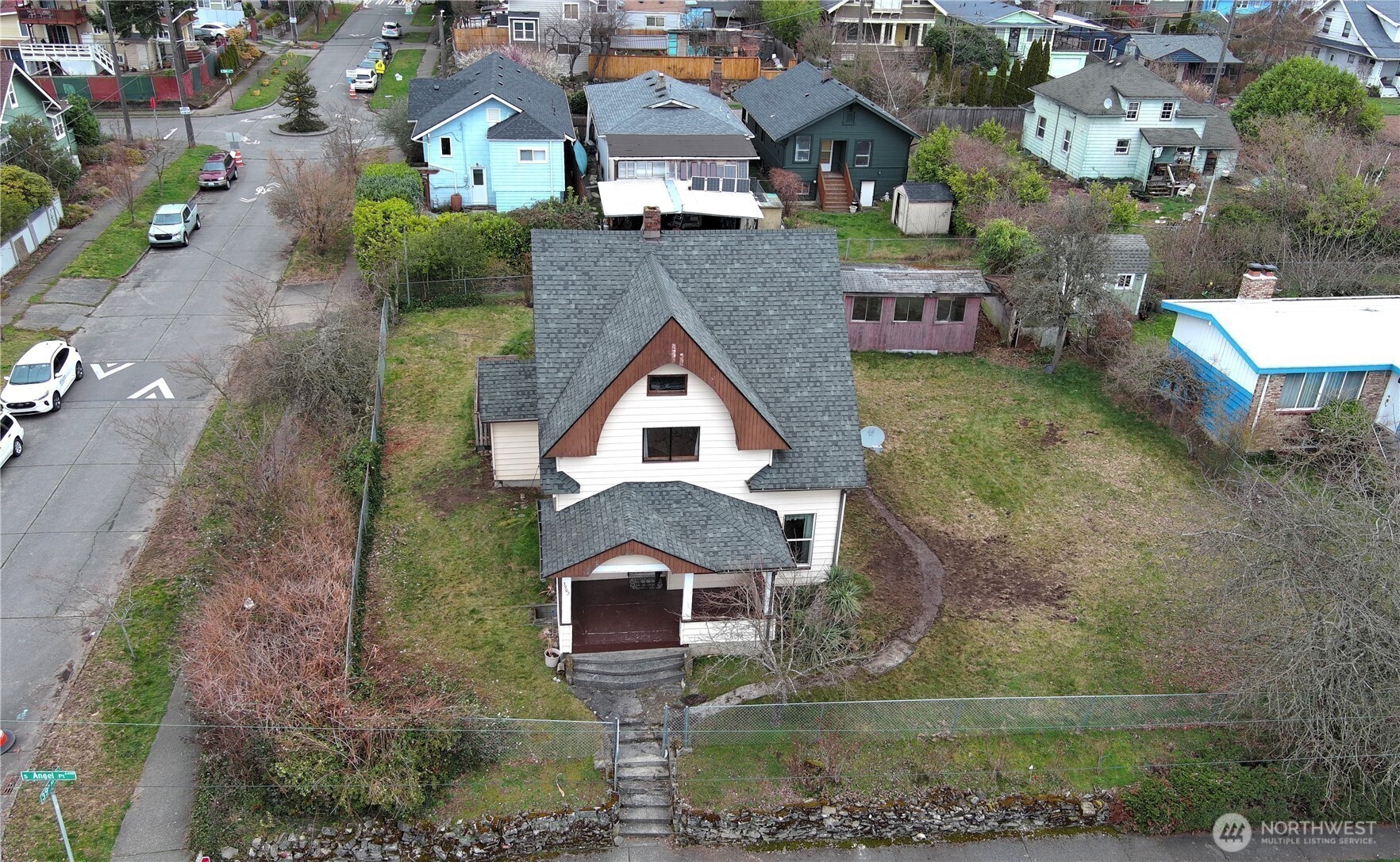 3902 South Angel Place Seattle, WA 98118 - Photo 11 of 39 an aerial view of a house with a yard