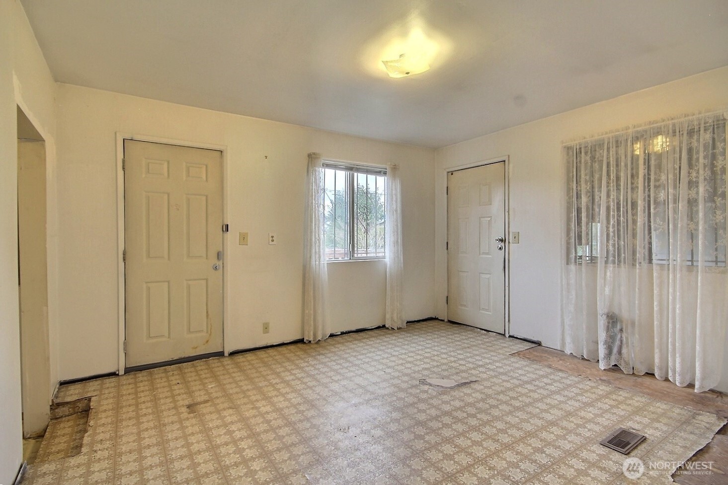 3902 South Angel Place Seattle, WA 98118 - Photo 23 of 39 an empty room with windows