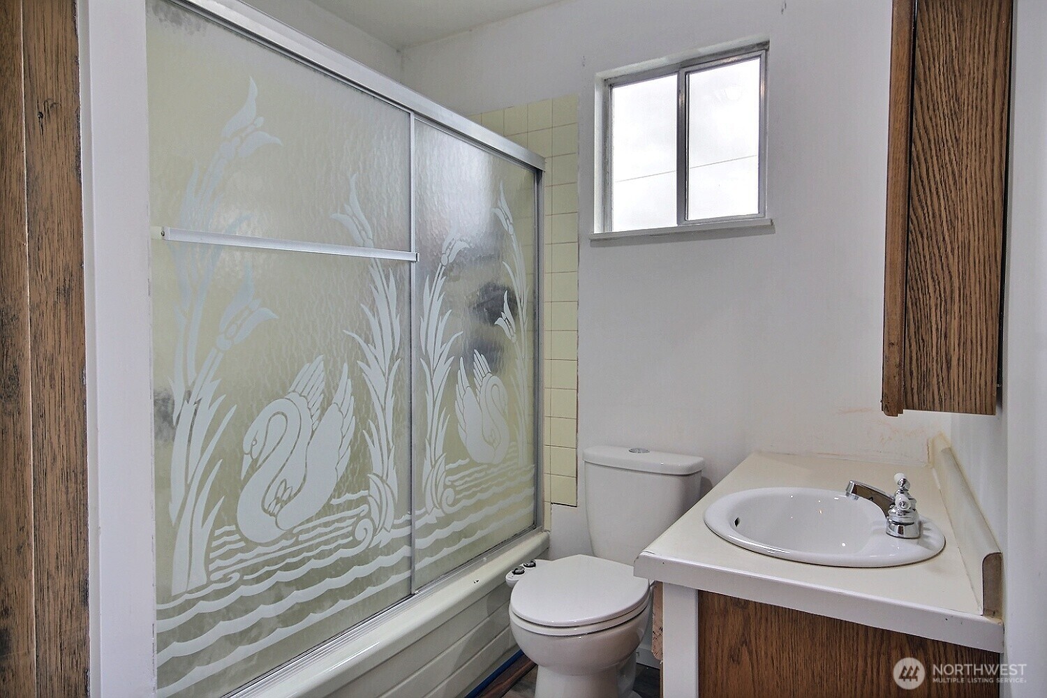 3902 South Angel Place Seattle, WA 98118 - Photo 25 of 39 a bathroom with a sink toilet and shower