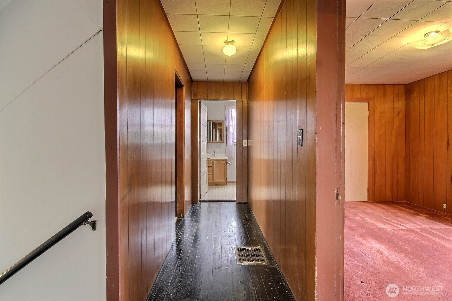 3902 South Angel Place Seattle, WA 98118 - Photo 29 of 39 view of a hallway with wooden floor