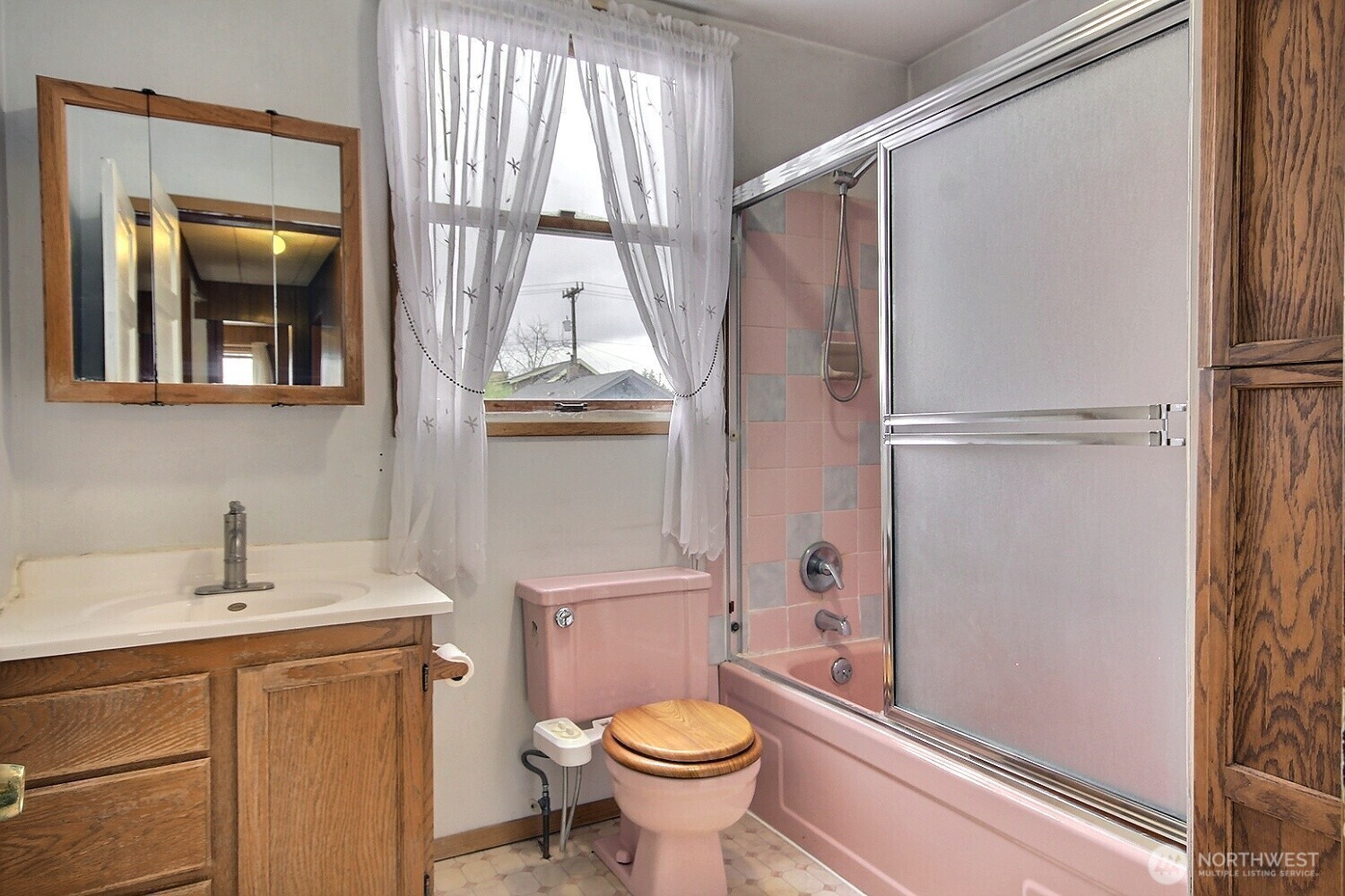 3902 South Angel Place Seattle, WA 98118 - Photo 31 of 39 a bathroom with a sink a toilet and shower