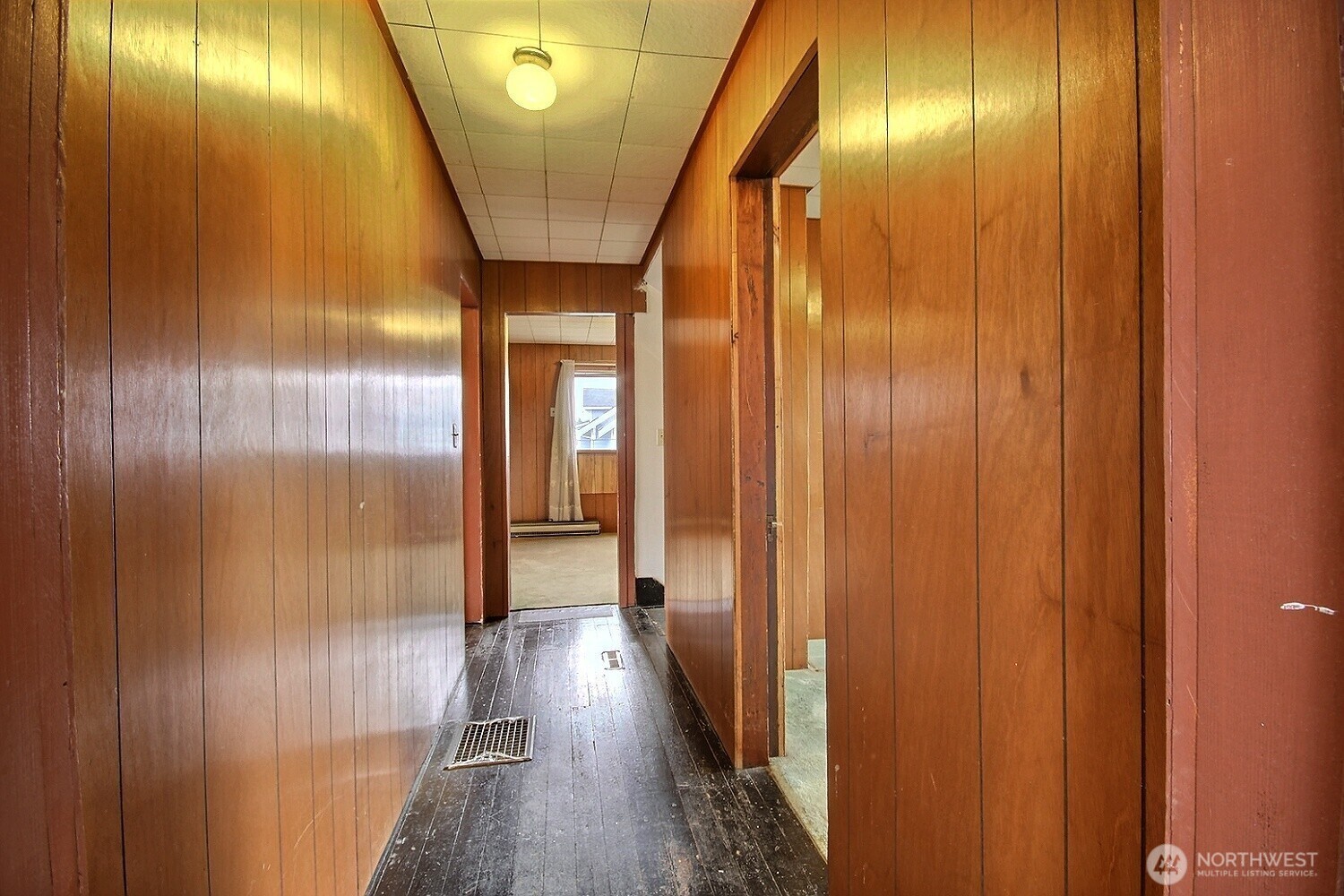 3902 South Angel Place Seattle, WA 98118 - Photo 33 of 39 a very nice looking hallway with a door