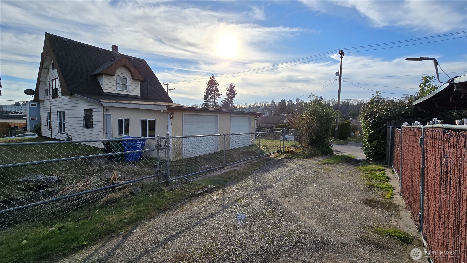 3902 South Angel Place Seattle, WA 98118 - Photo 5 of 39 a view of a house with a yard