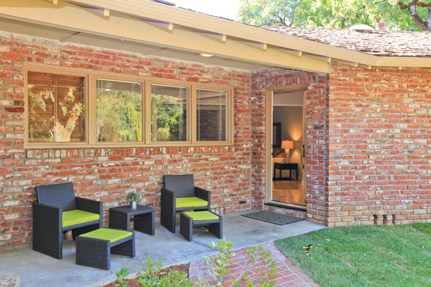 3490 Tripp Road Woodside, CA 94062 - Photo 3 of 22 a front view of a house with outdoor seating