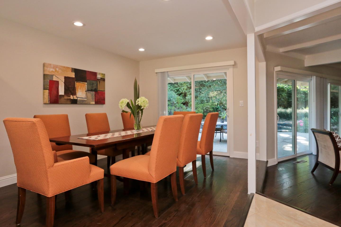 3490 Tripp Road Woodside, CA 94062 - Photo 6 of 22 a view of a dining room with furniture and wooden floor
