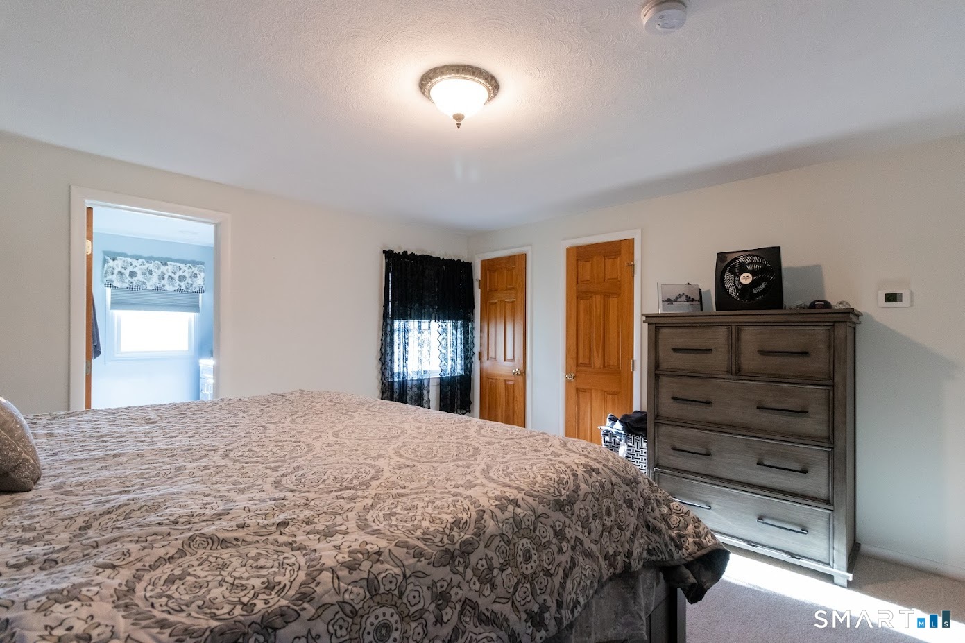 763 North Street Suffield, CT 06078 - Photo 26 of 40 a bedroom with a bed and a window