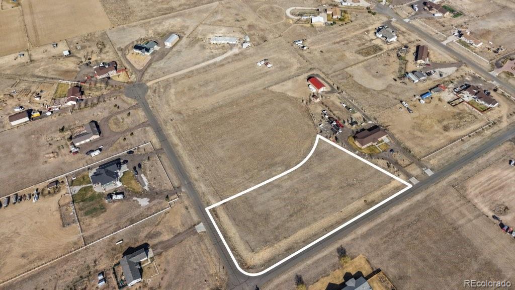 13939 Gentry Street Hudson, CO 80642 - Photo 1 of 5 an aerial view of beach