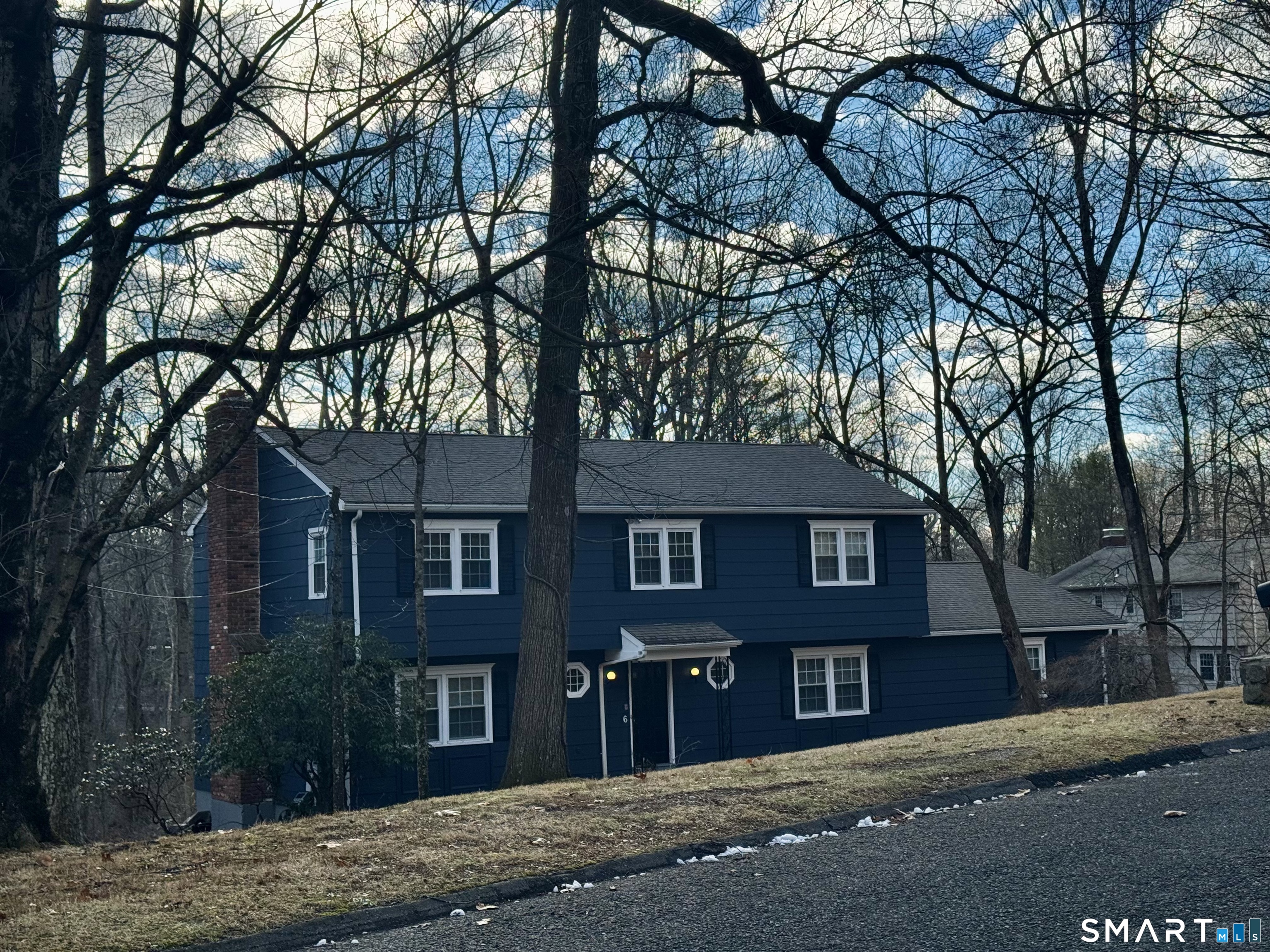 6 Redcoat Lane Trumbull, CT 06611 - Photo 1 of 30 a front view of a house with a yard