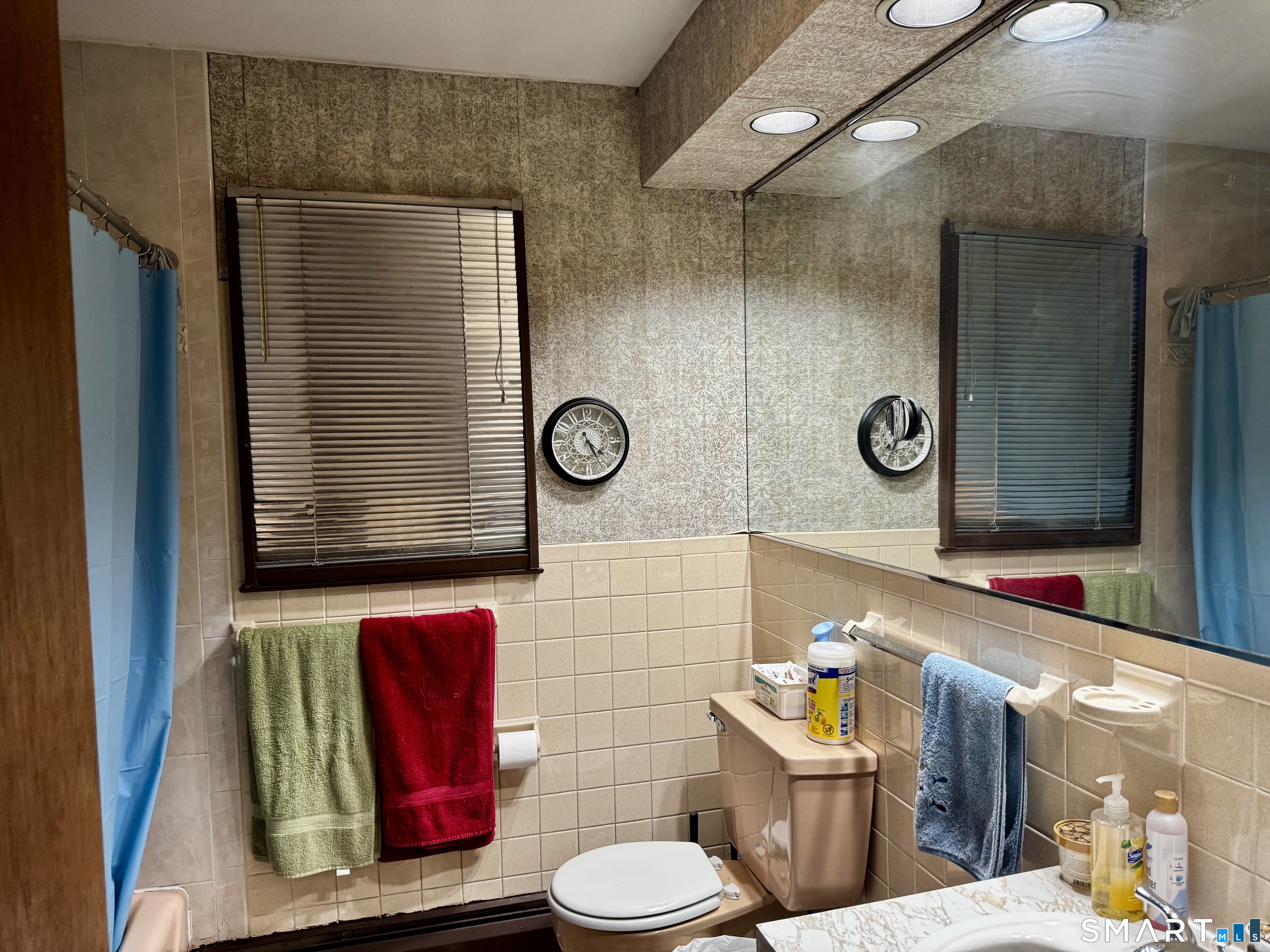 6 Redcoat Lane Trumbull, CT 06611 - Photo 19 of 30 a bathroom with a toilet and a shower curtain