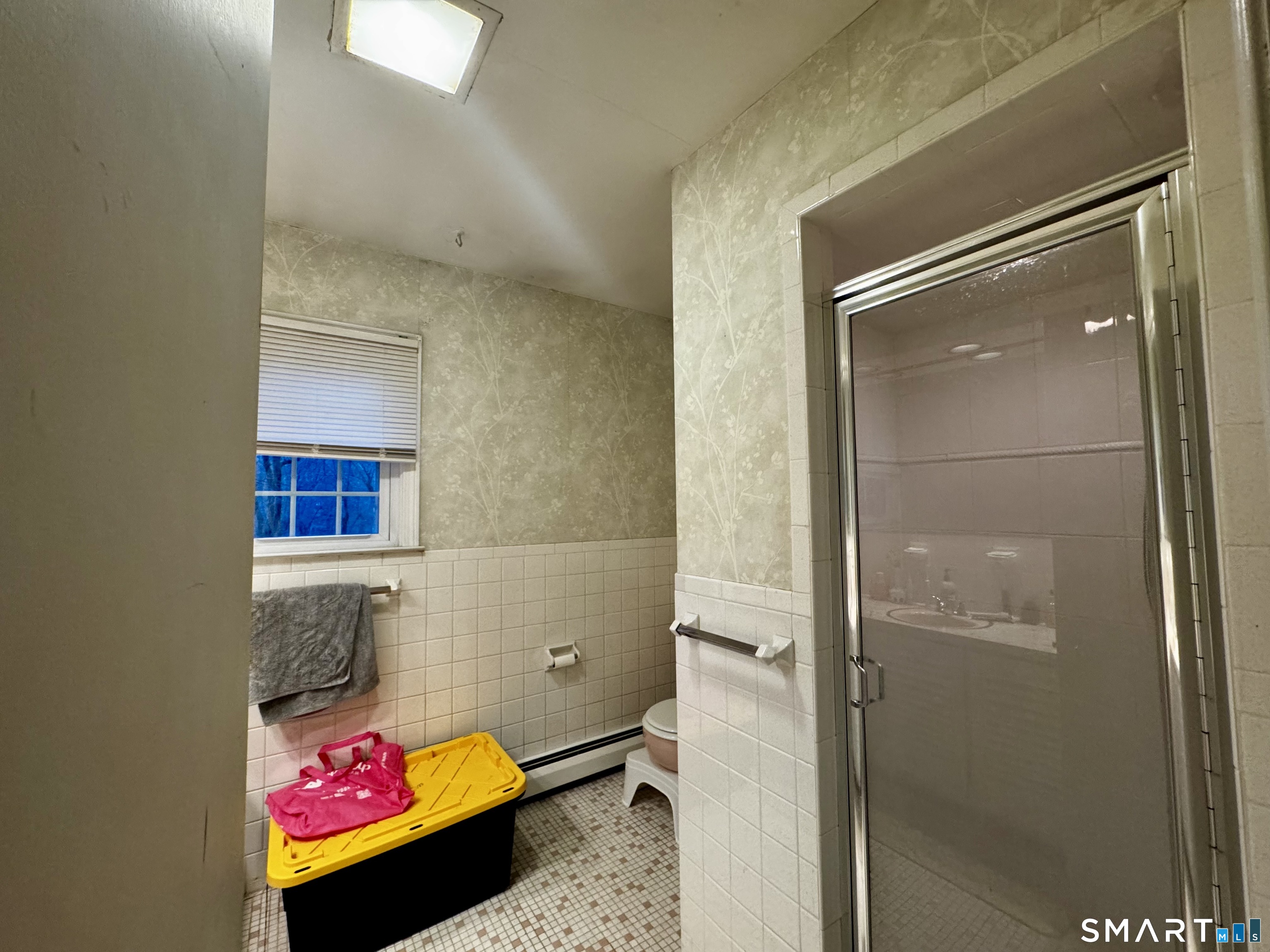 6 Redcoat Lane Trumbull, CT 06611 - Photo 21 of 30 a bathroom with a tub and shower