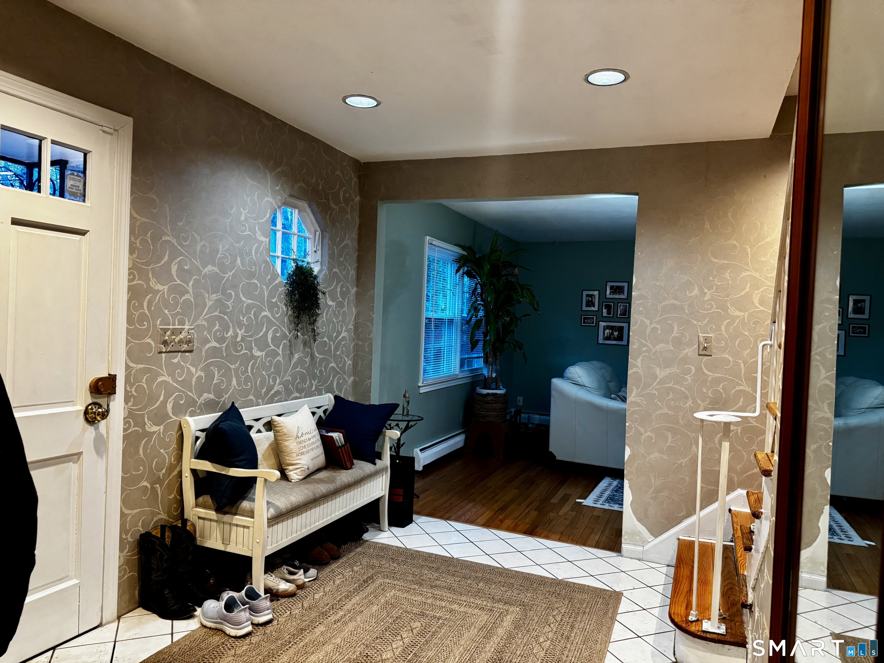 6 Redcoat Lane Trumbull, CT 06611 - Photo 6 of 30 a living room with furniture and a rug