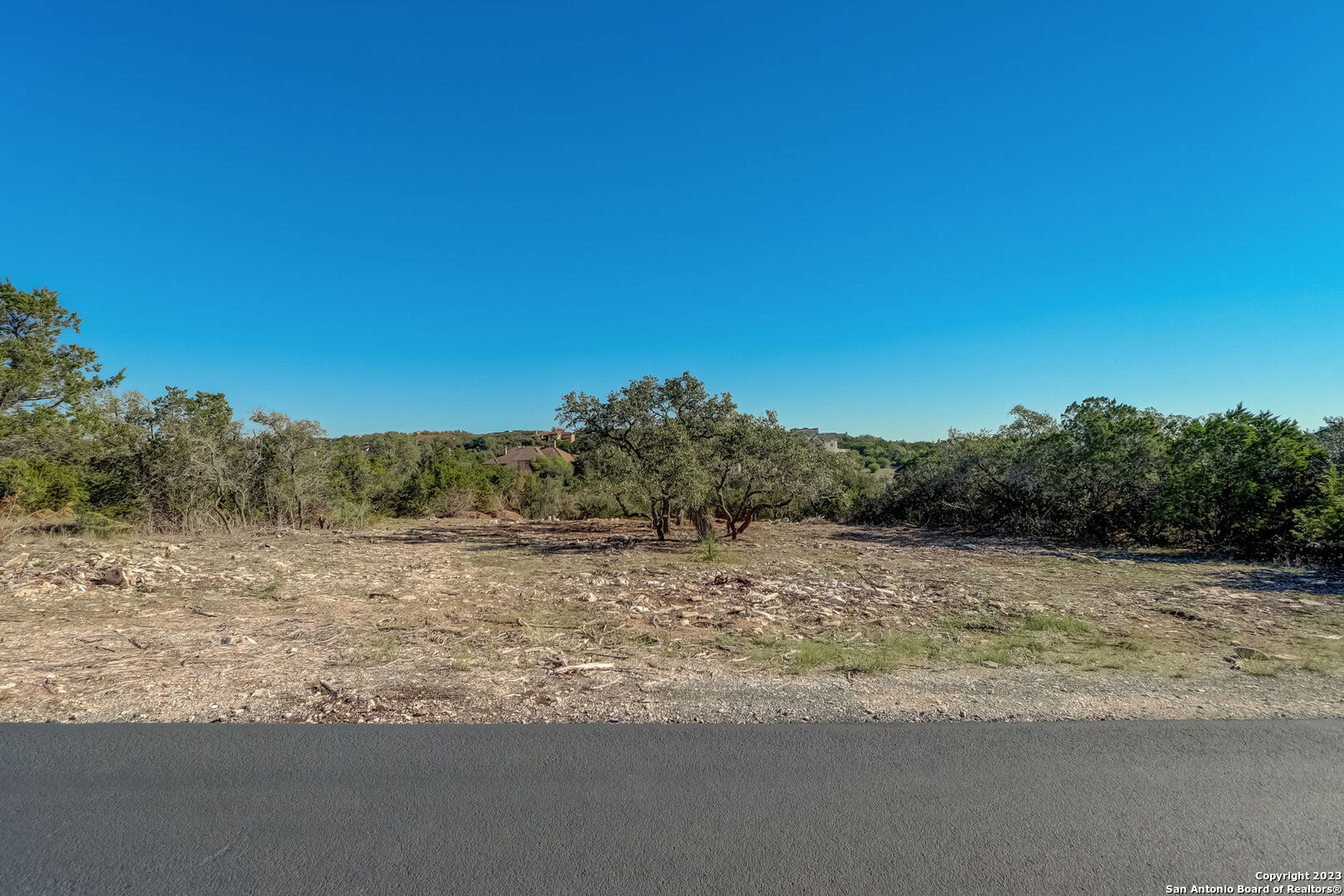 22740 Fossil Ridge San Antonio, TX 78261 - Photo 11 of 18 a view of a beach with a mountain in the background