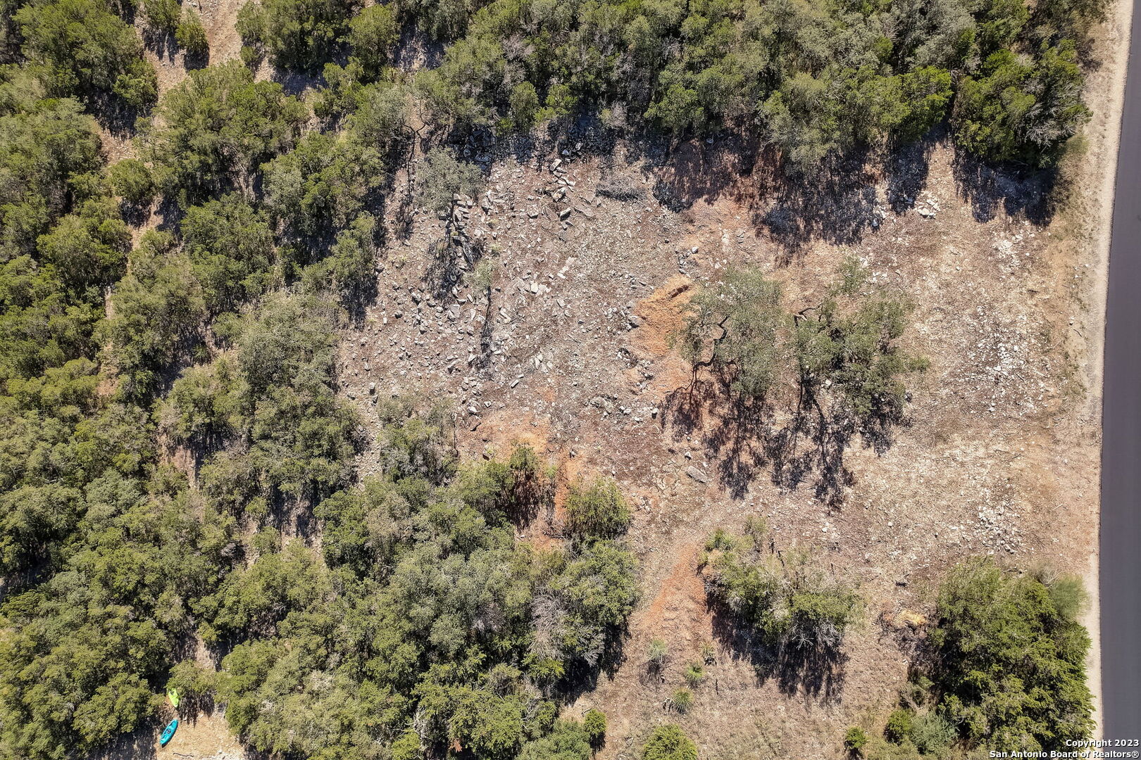 22740 Fossil Ridge San Antonio, TX 78261 - Photo 3 of 18 a view of a yard with trees