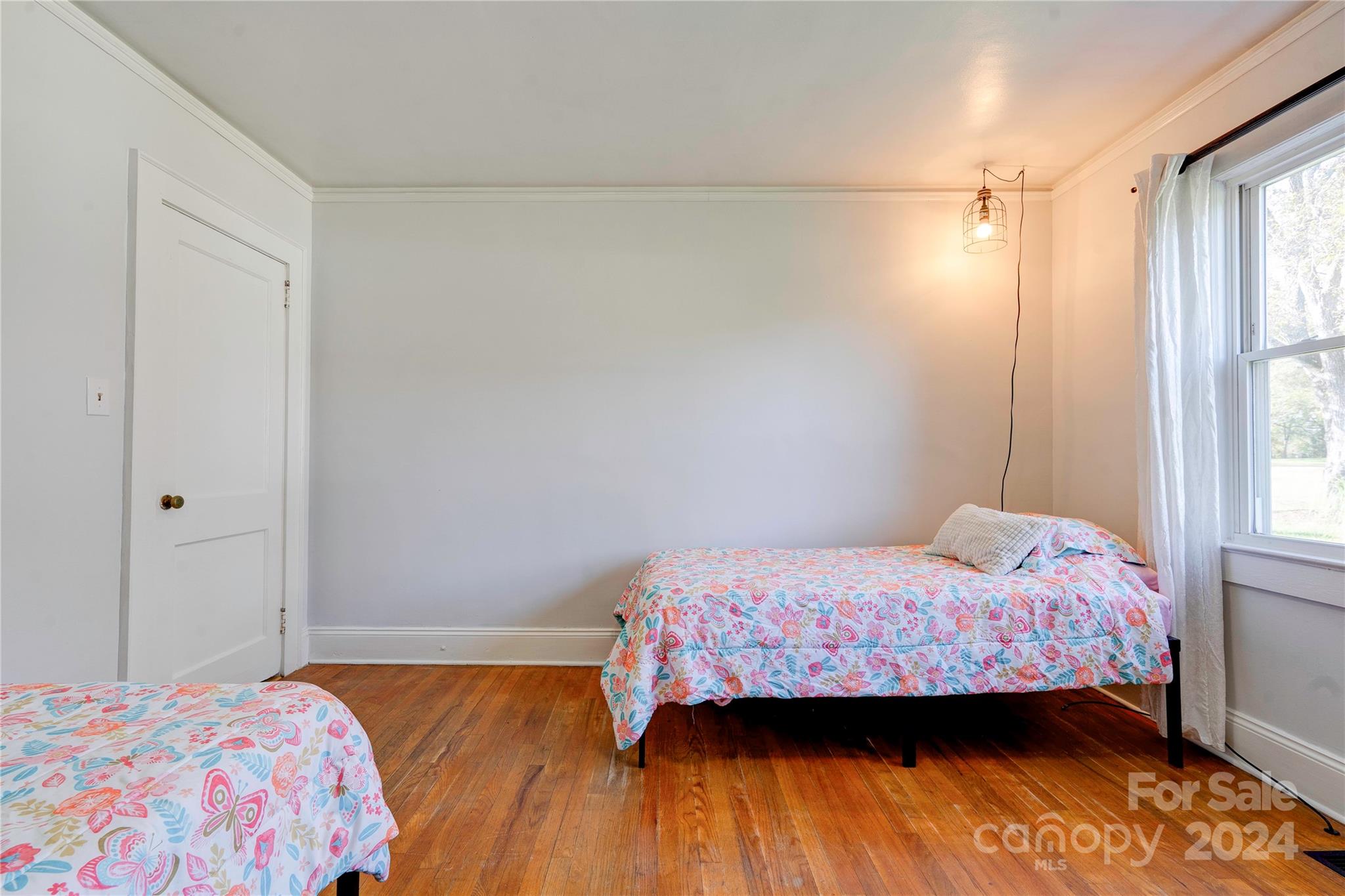 414 Poplar Springs Church Road Shelby, NC 28152 - Photo 20 of 37 a bedroom with a bed and a window