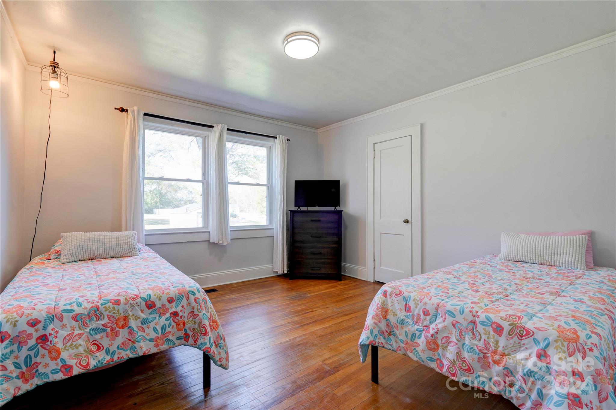 414 Poplar Springs Church Road Shelby, NC 28152 - Photo 21 of 37 a bedroom with a bed and a flat screen tv