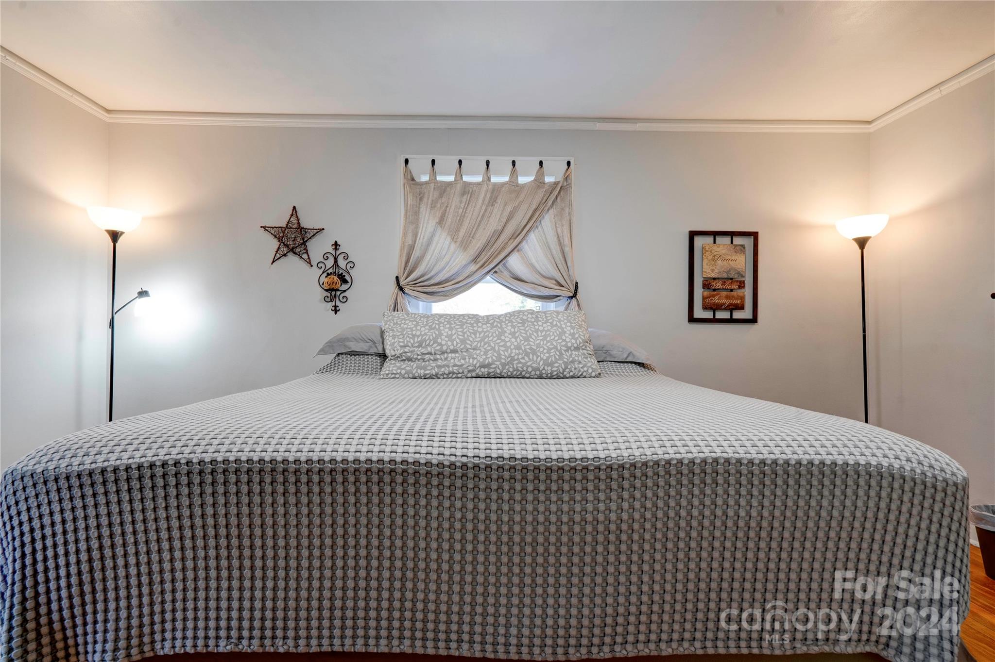 414 Poplar Springs Church Road Shelby, NC 28152 - Photo 24 of 37 a bedroom with a bed and a mirror