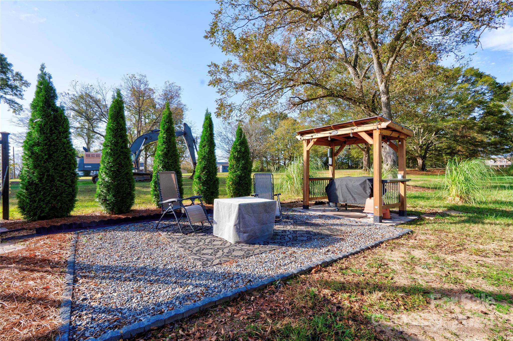 414 Poplar Springs Church Road Shelby, NC 28152 - Photo 29 of 37 a view of a couches under an umbrella