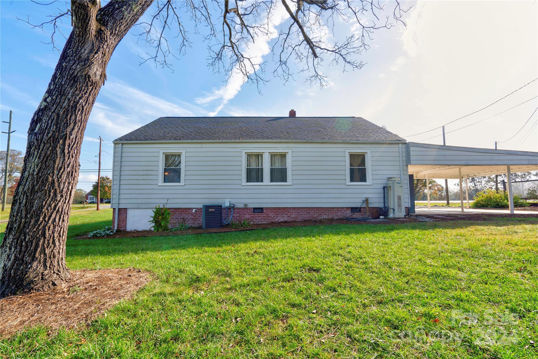 414 Poplar Springs Church Road Shelby, NC 28152 - Photo 30 of 37 a view of a backyard with a garden
