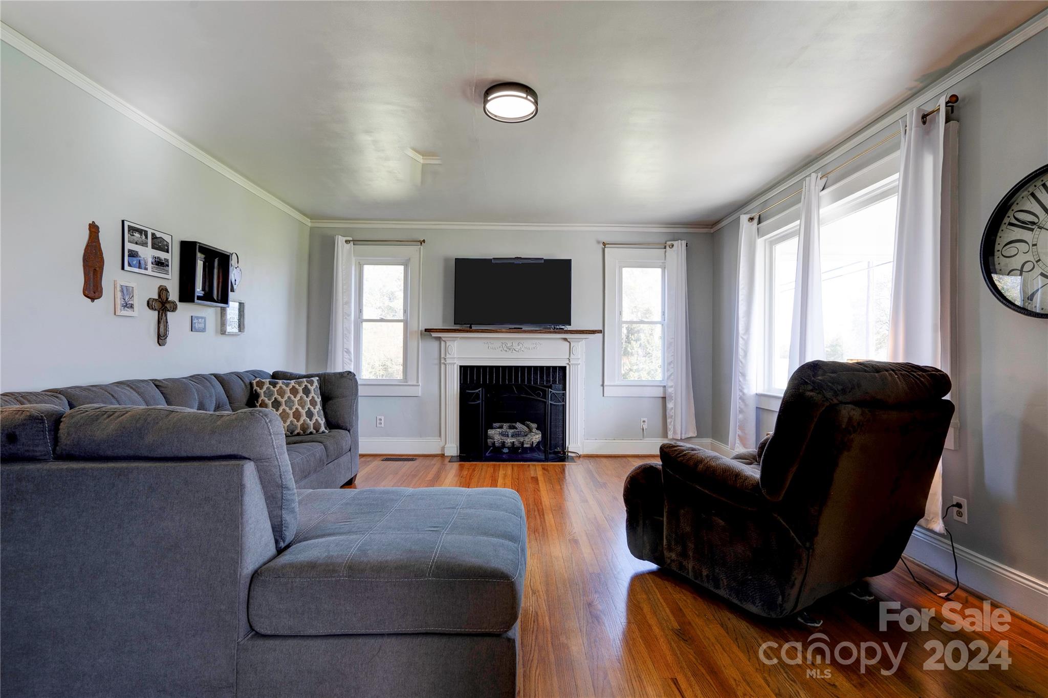 414 Poplar Springs Church Road Shelby, NC 28152 - Photo 3 of 37 a living room with furniture and a fireplace