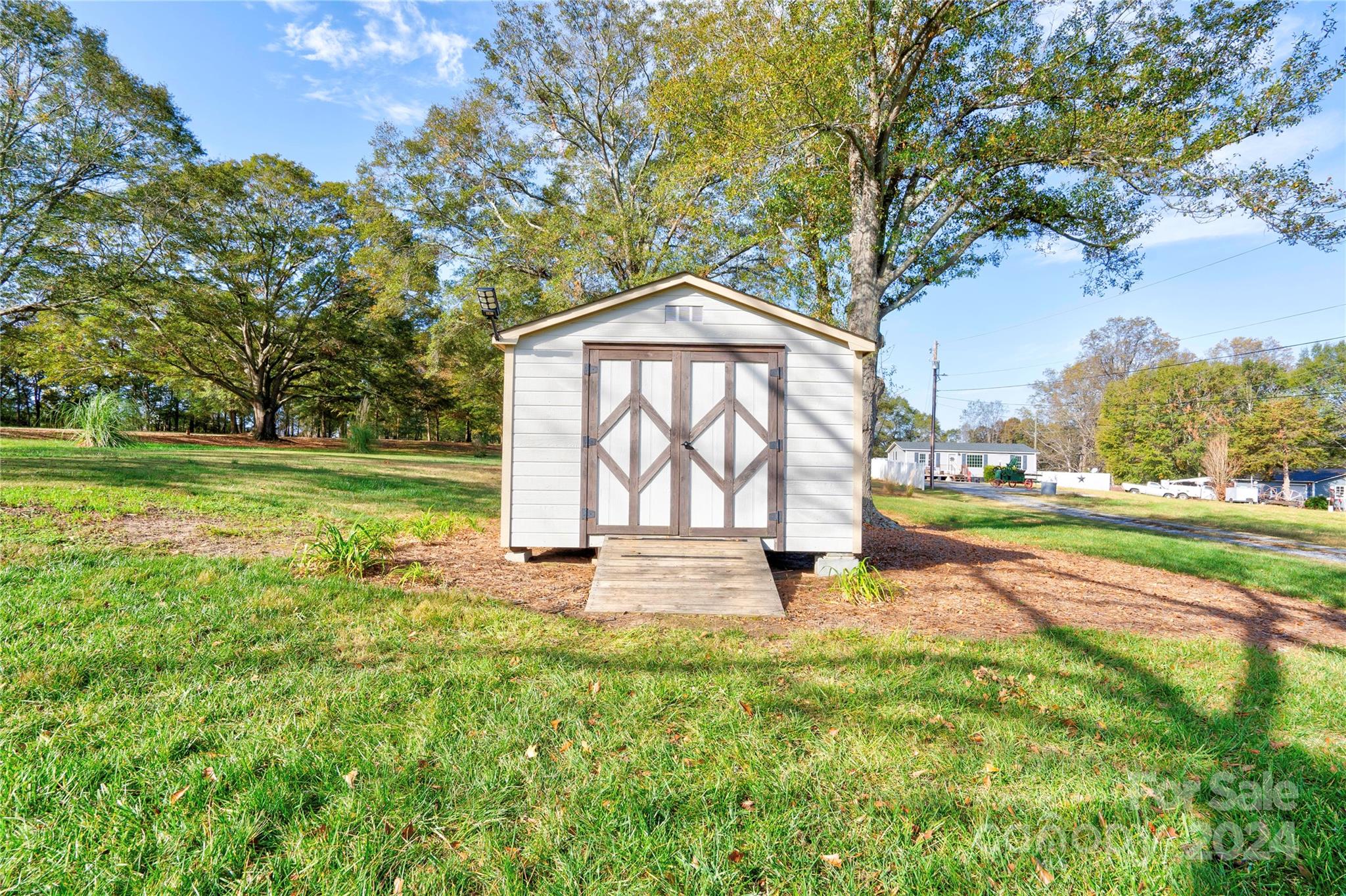 414 Poplar Springs Church Road Shelby, NC 28152 - Photo 36 of 37 a view of a yard with a large trees