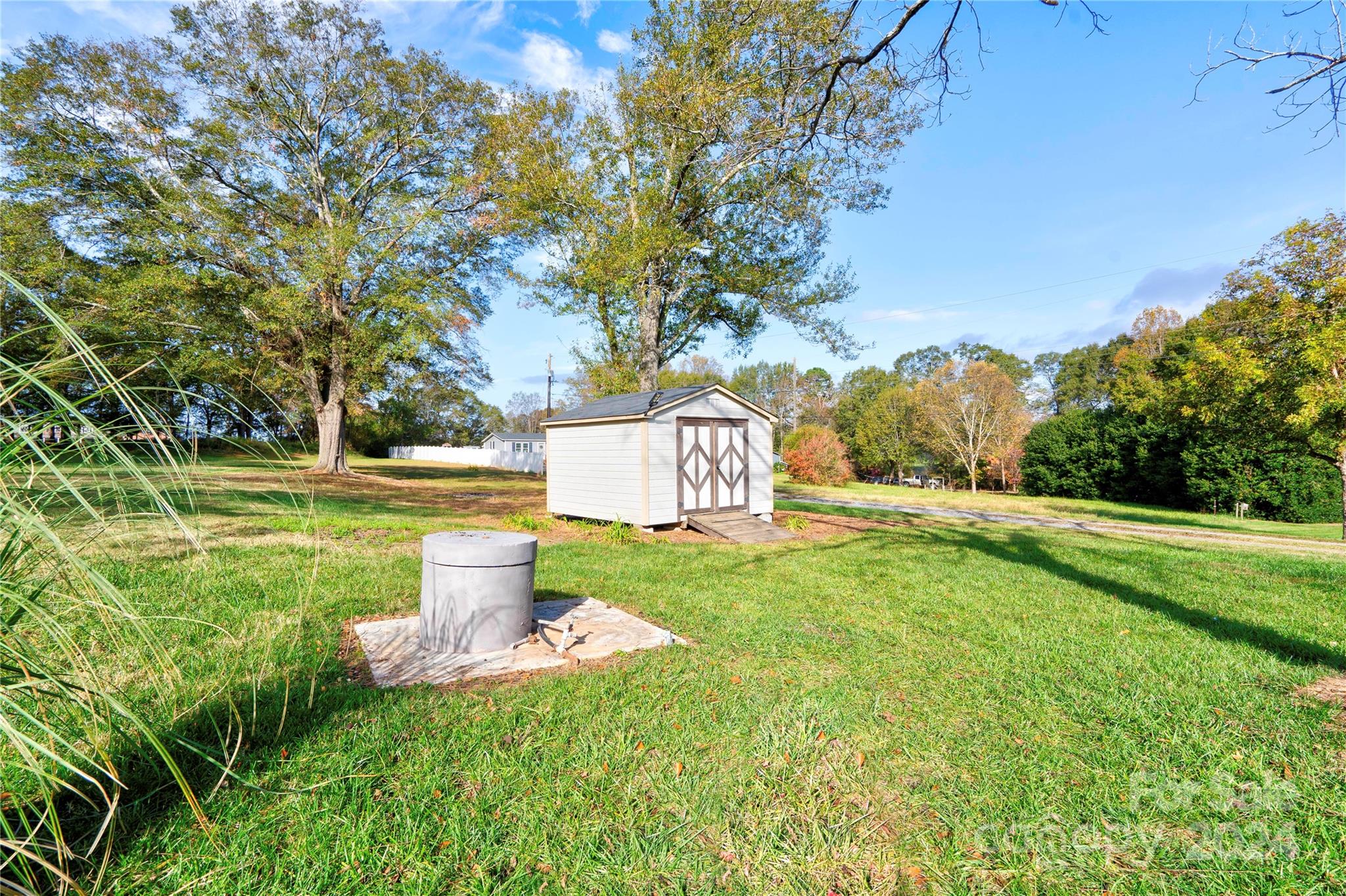 414 Poplar Springs Church Road Shelby, NC 28152 - Photo 37 of 37 a view of a trees and barn in the back yard