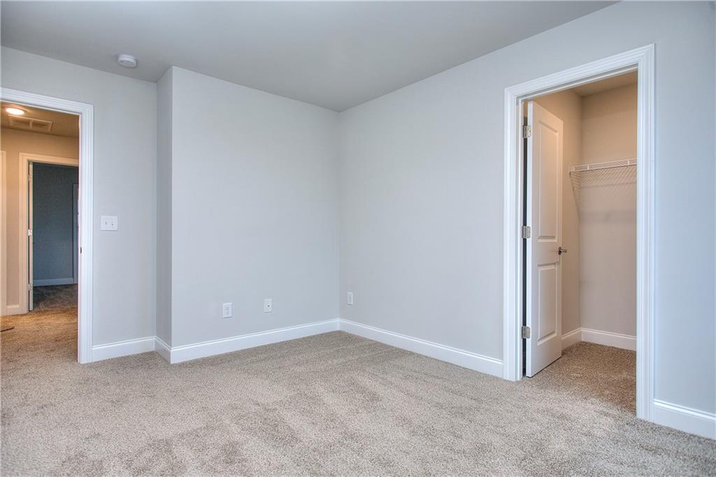 113 Swallowtail Lane Homer, GA 30547 - Photo 38 of 45 an empty room with closet and a bathroom