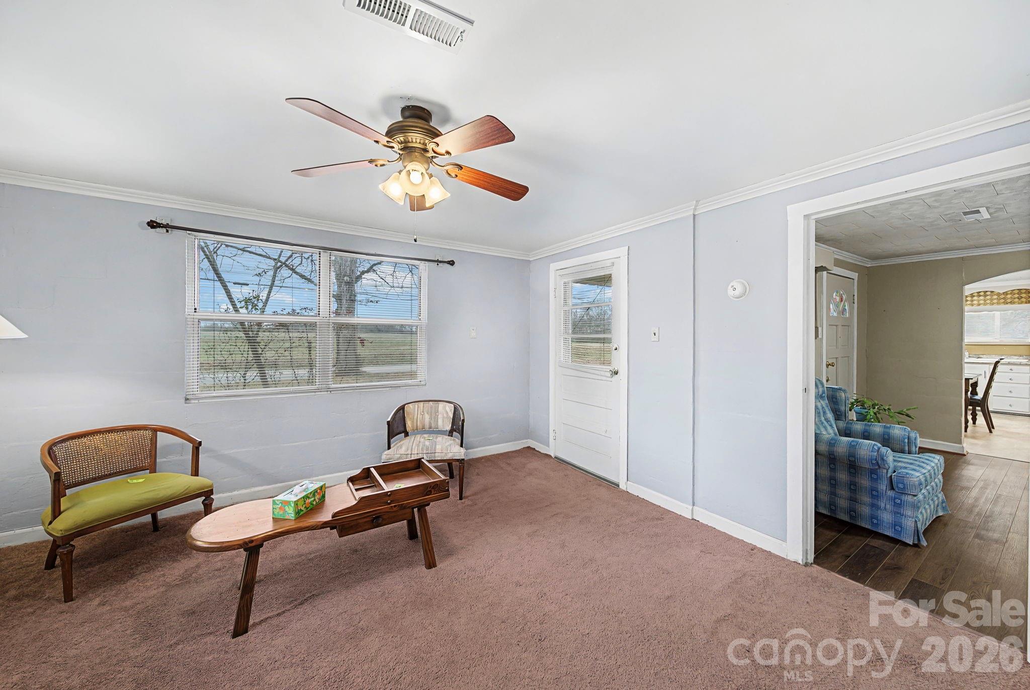 14309 Liberty Hill Church Road Oakboro, NC 28129 - Photo 15 of 37 a living room with furniture