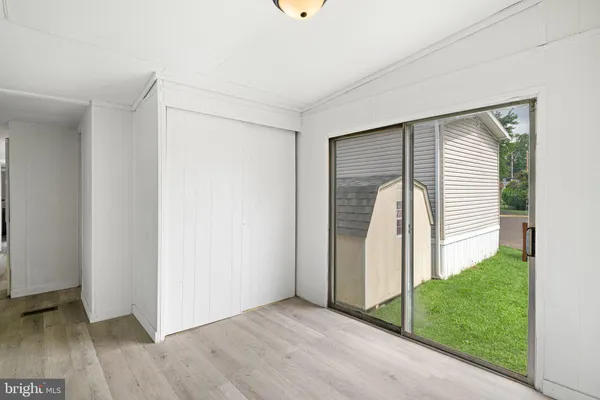 a view of a kitchen with a sink and dishwasher cabinets