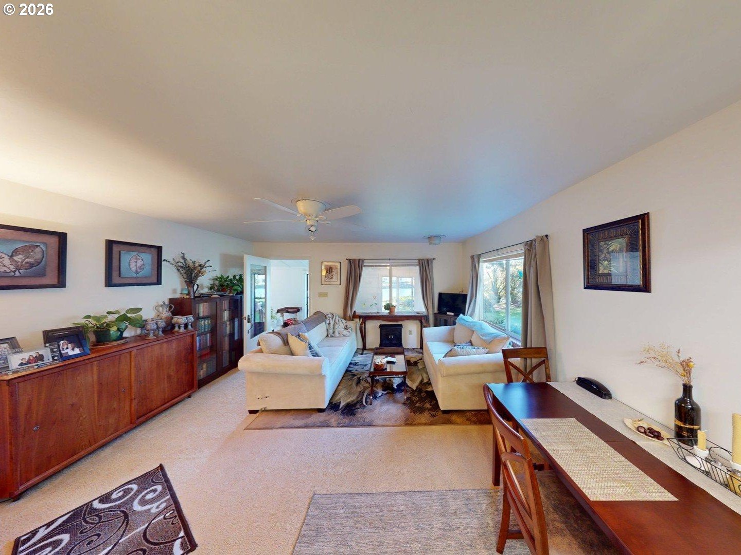 99270 Winchuck River Road Brookings, OR 97415 - Photo 16 of 40 a living room with furniture and wooden floor
