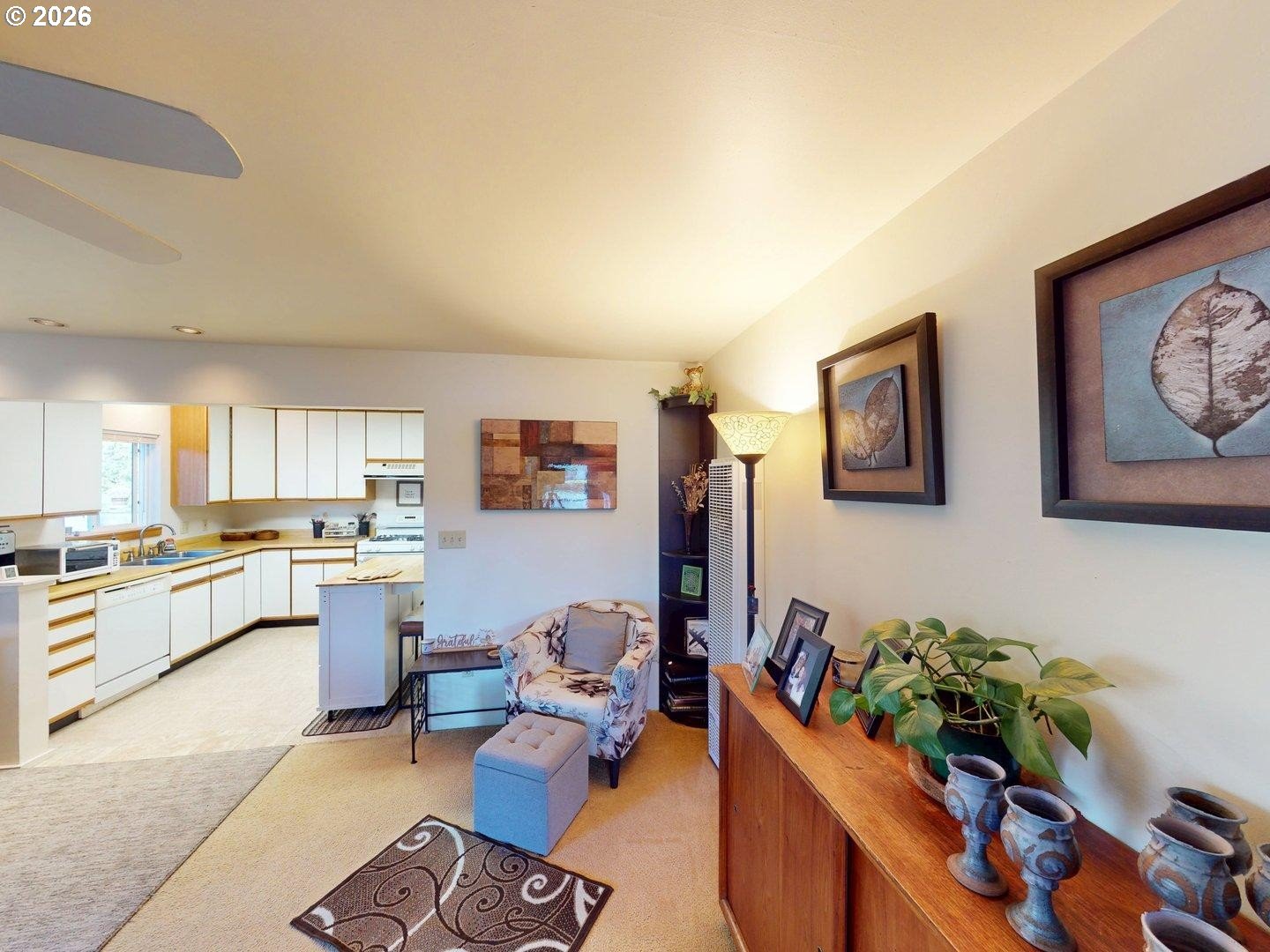 99270 Winchuck River Road Brookings, OR 97415 - Photo 19 of 40 a living room with furniture and a kitchen
