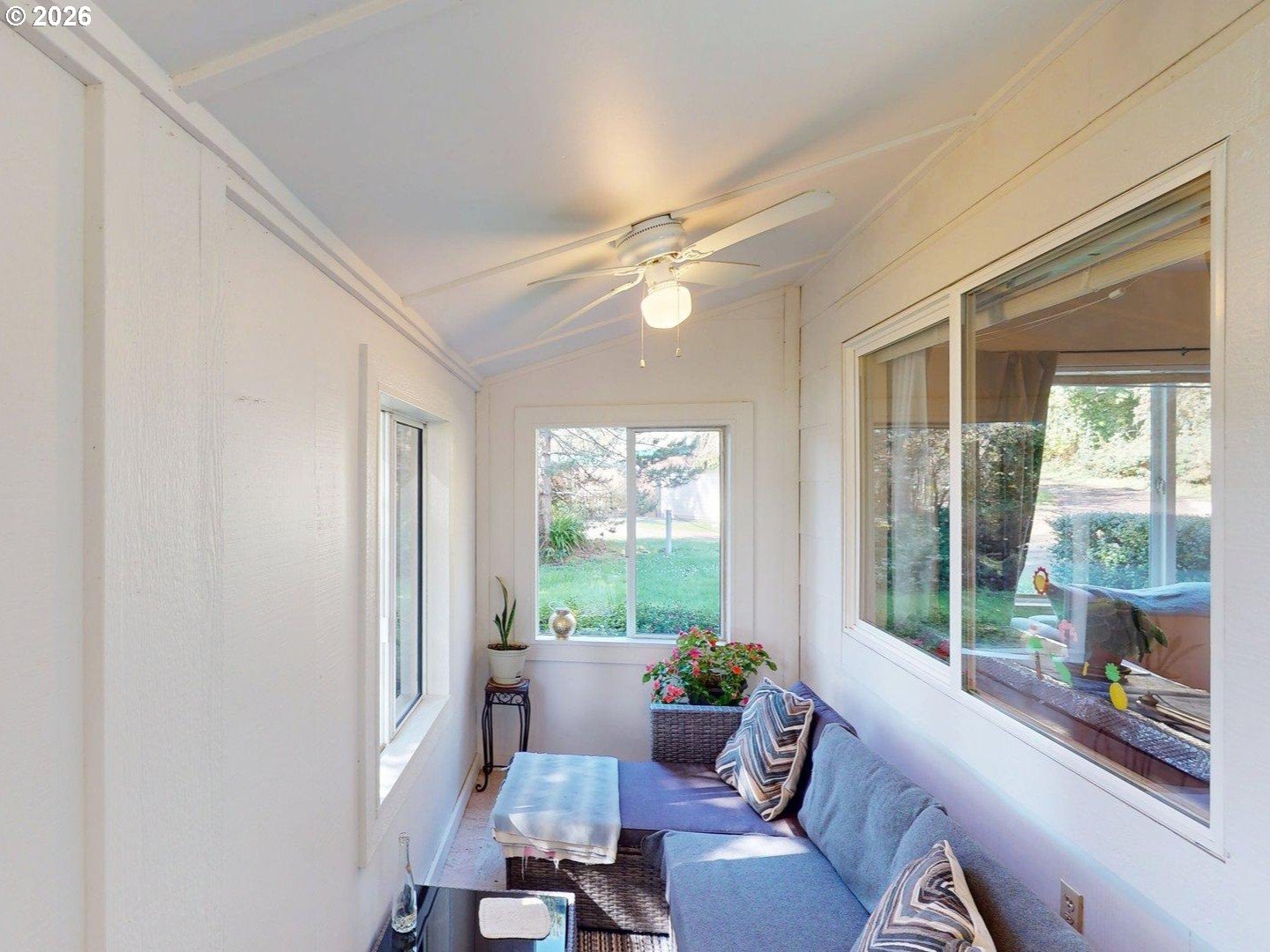 99270 Winchuck River Road Brookings, OR 97415 - Photo 25 of 40 a living room with furniture and a window
