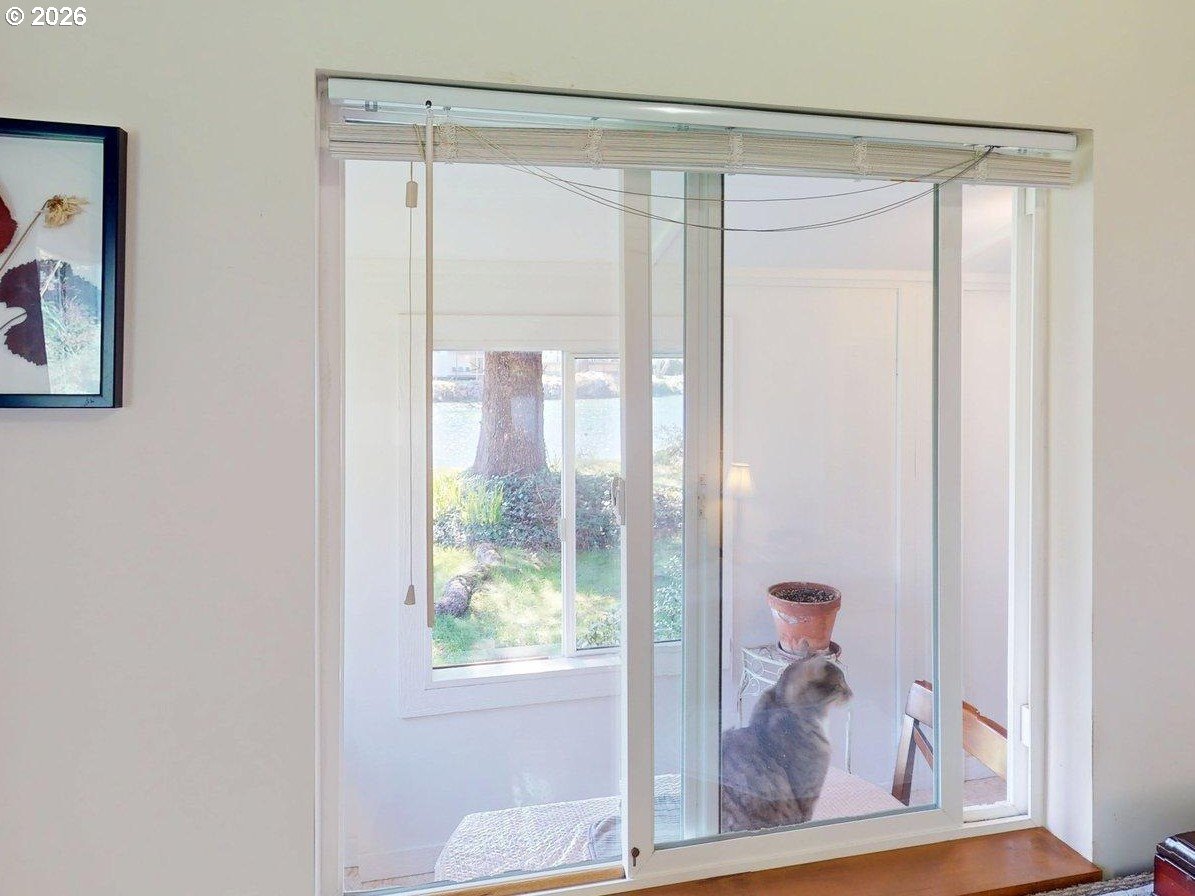 99270 Winchuck River Road Brookings, OR 97415 - Photo 31 of 40 a view of a glass door and glass door