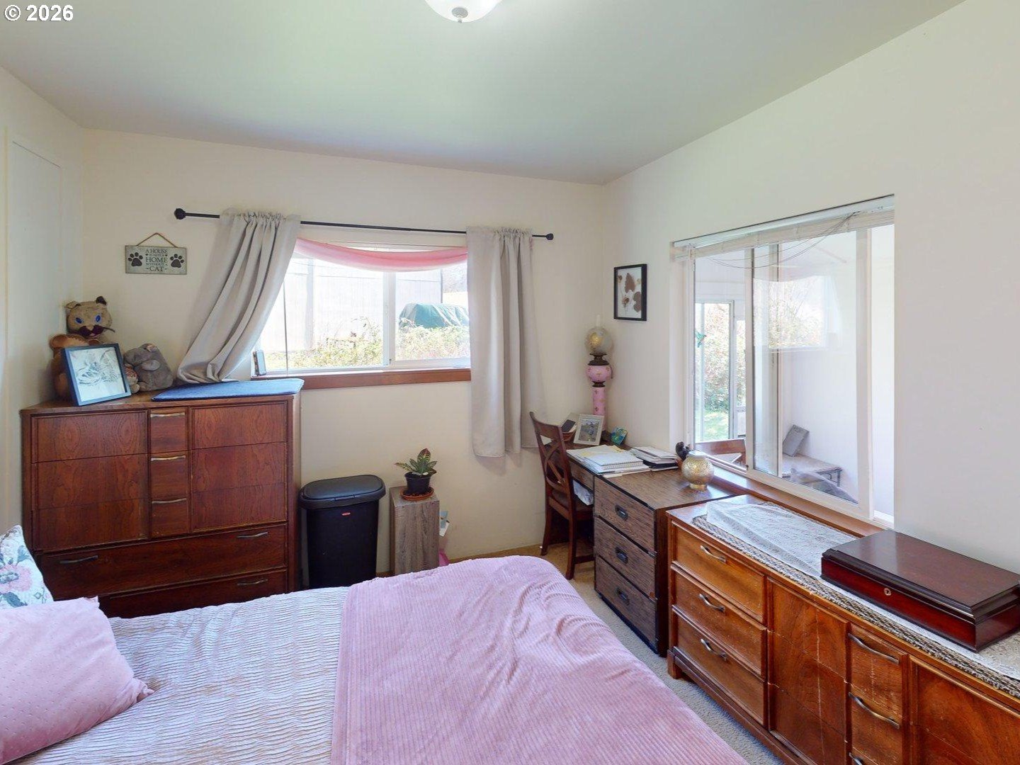 99270 Winchuck River Road Brookings, OR 97415 - Photo 33 of 40 a bed room with a bed and a window