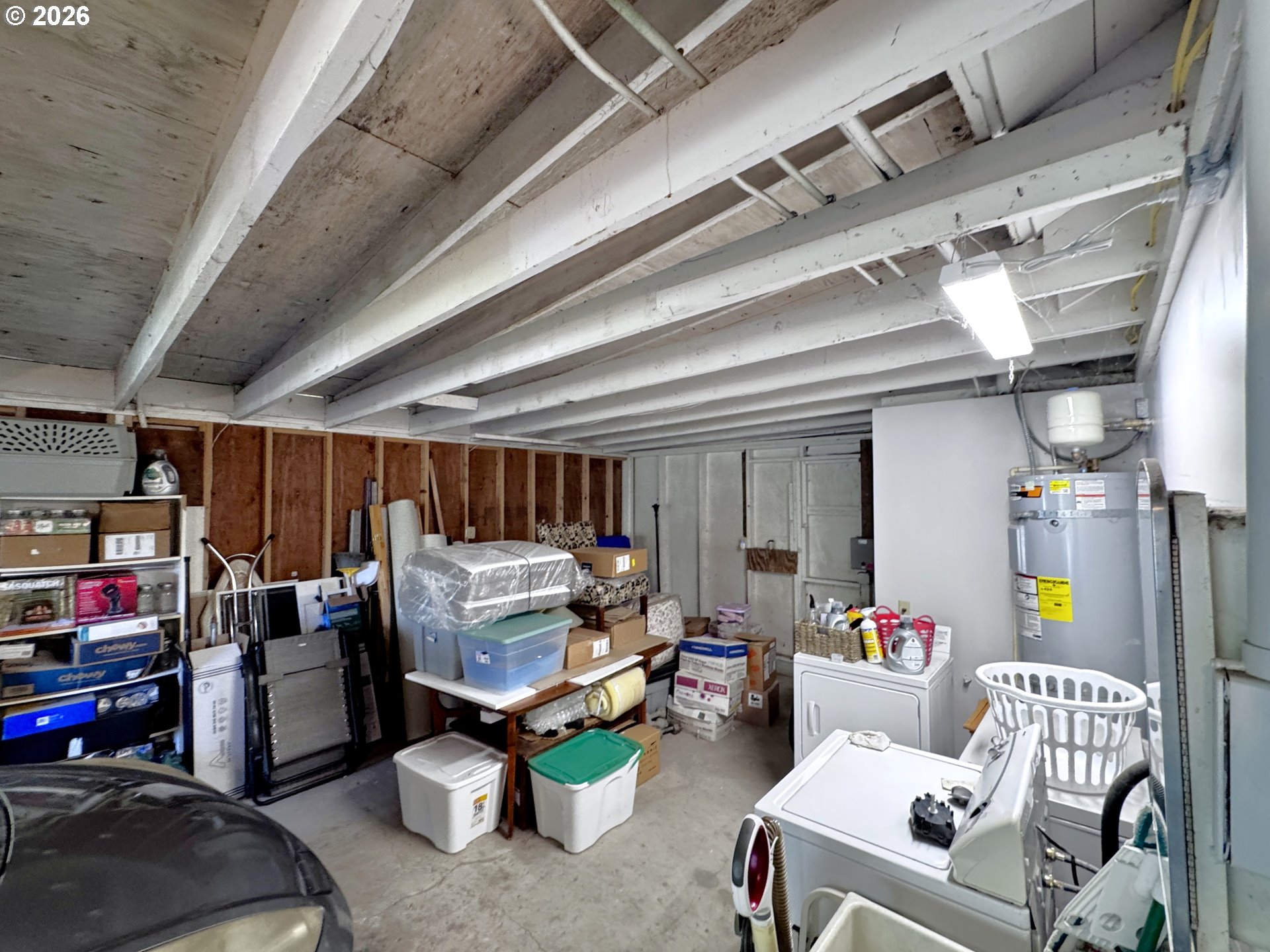 99270 Winchuck River Road Brookings, OR 97415 - Photo 34 of 40 a living room with lots of furniture and a chandelier