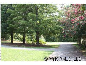 378 Hooker Road Tryon, NC 28782 - Photo 3 of 11 a view of yard with green space
