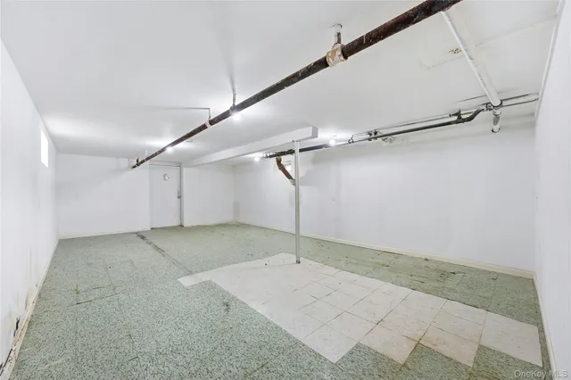 a view of a room with an entryway