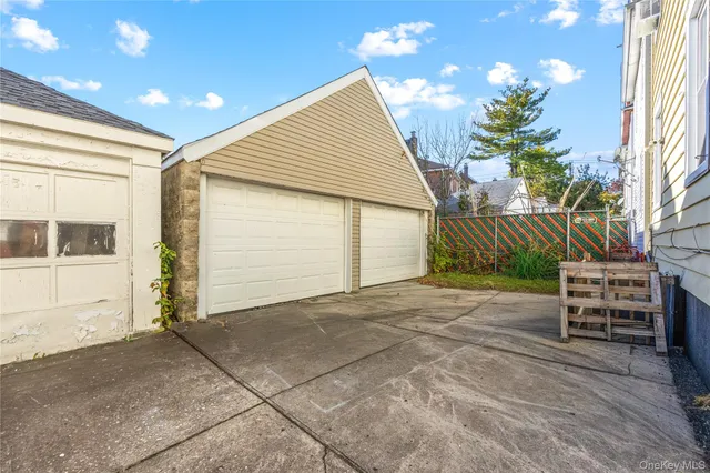 a view of a porch with a table and chairs and potted plants