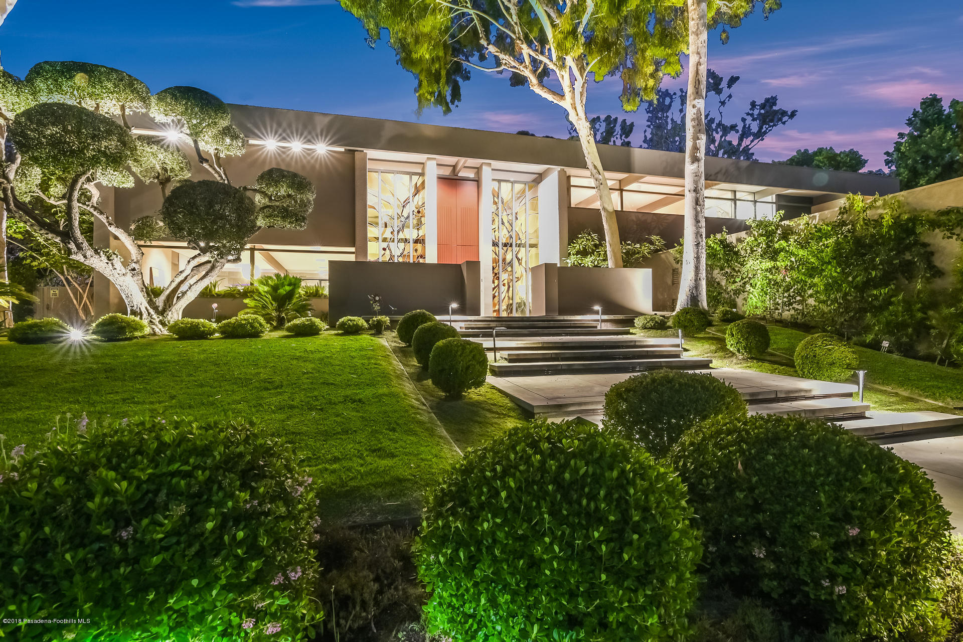 a view of a bench in front of a building