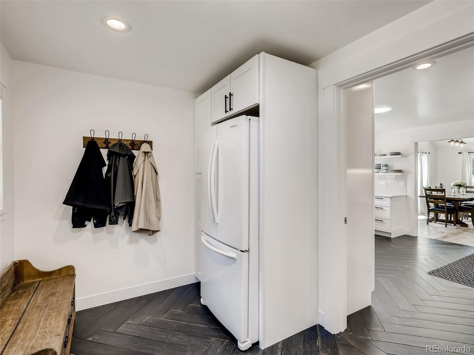 900 Cherryvale Road Boulder, CO 80303 - Photo 17 of 30 a view of walk in closet with clothes and wooden floor
