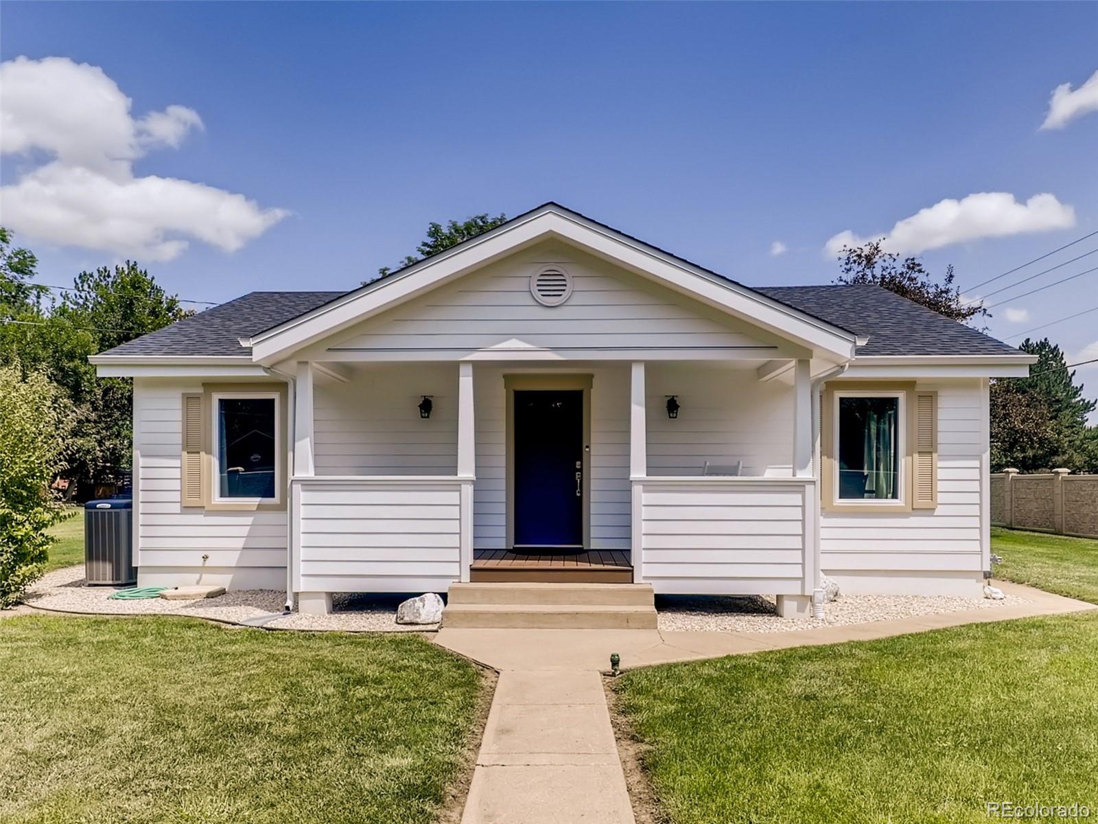 900 Cherryvale Road Boulder, CO 80303 - Photo 2 of 30 a front view of a house with yard